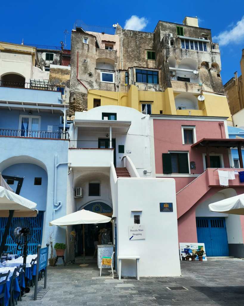 Colorful houses on Via Marina di Corricella, Procida island, Italy